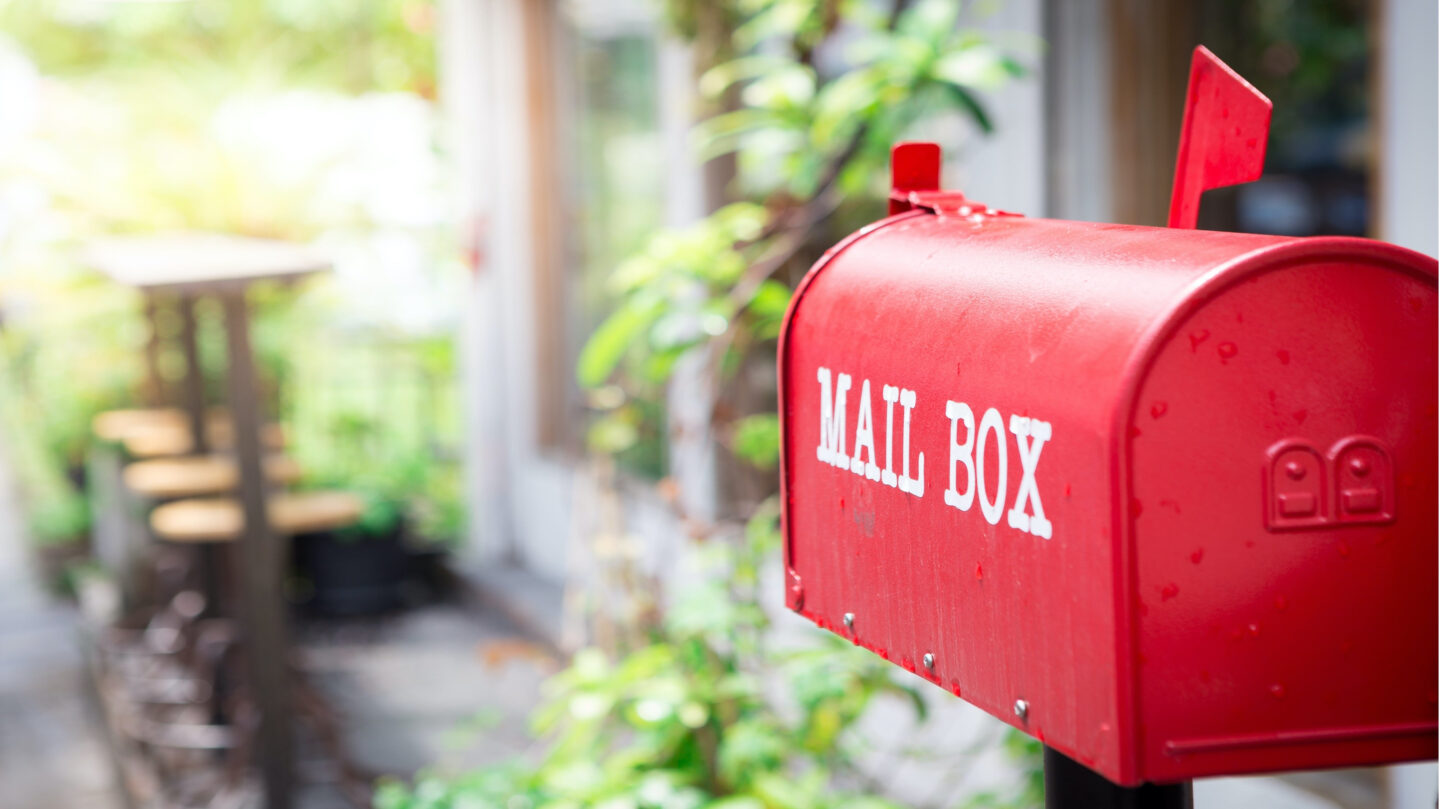 Red Mailbox At A Home In Canada