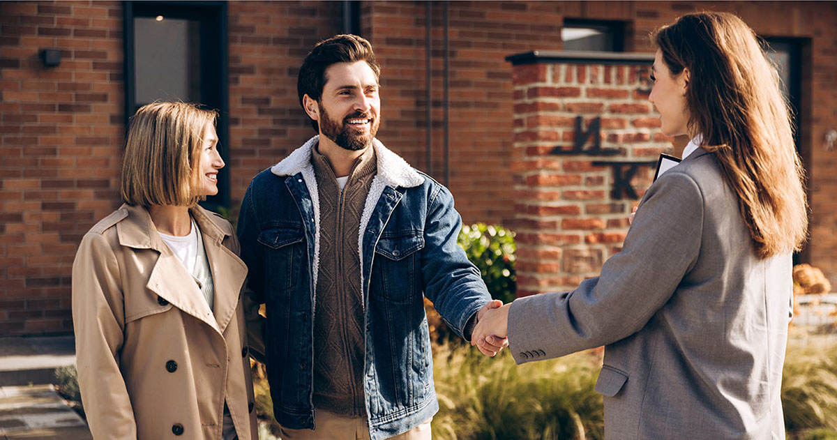 Three People Meet Outside A Morris Marketing Office
