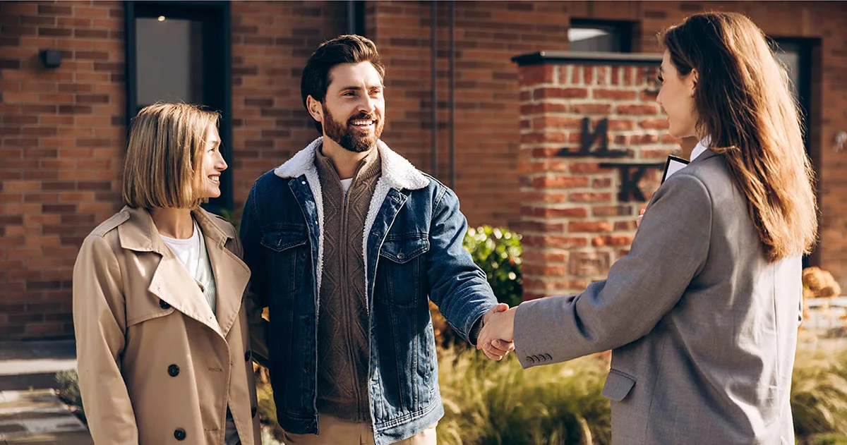 Three People Meet Outside A Morris Marketing Office